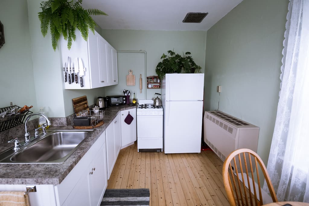 The recently remodeled kitchen is cute and inviting and has everything you need to feel right at home!