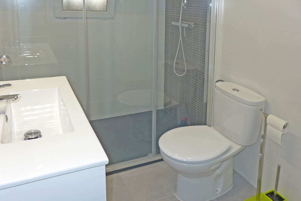 Bathroom with toilet and shower