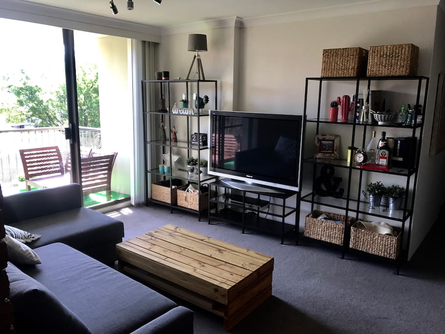 Living room (with sofa bed) with access to the balcony
