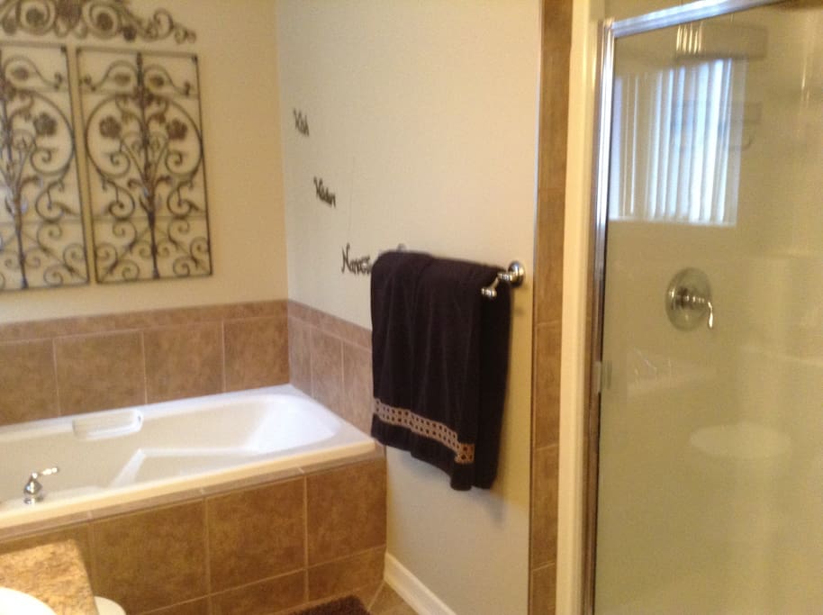 Separate shower and bath tub