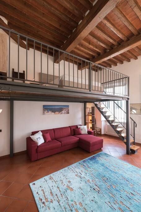 Living space with double bedded couch