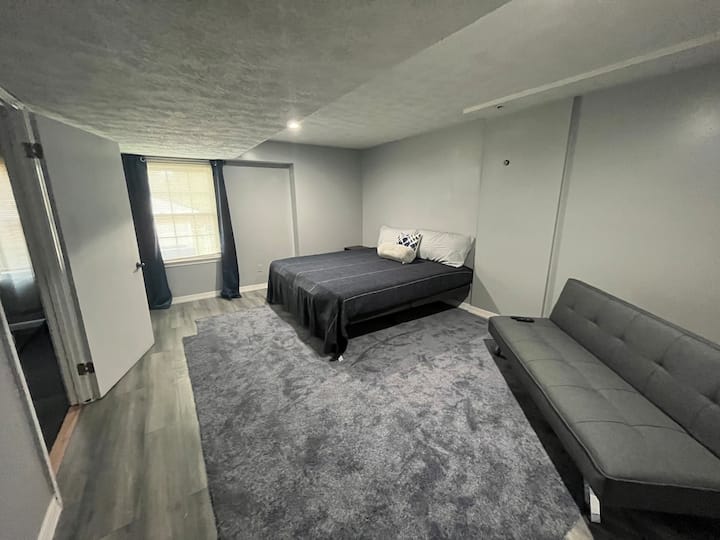 Lower level bonus bedroom with king bed and sofa bed, tucked just off the entertainment complex, perfect for the night owls in your group.