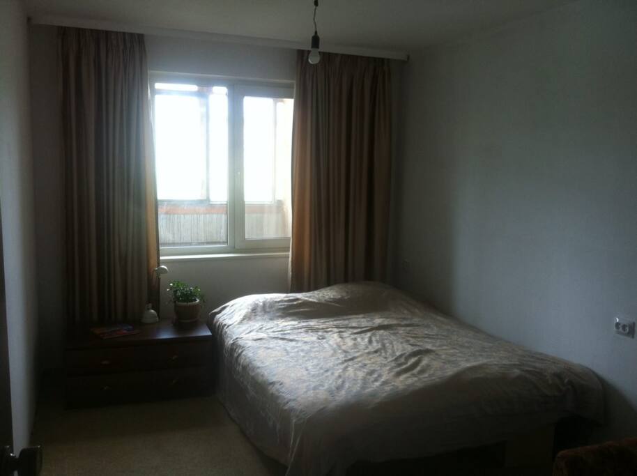 Bedroom with one double bed and single armchair-bed
