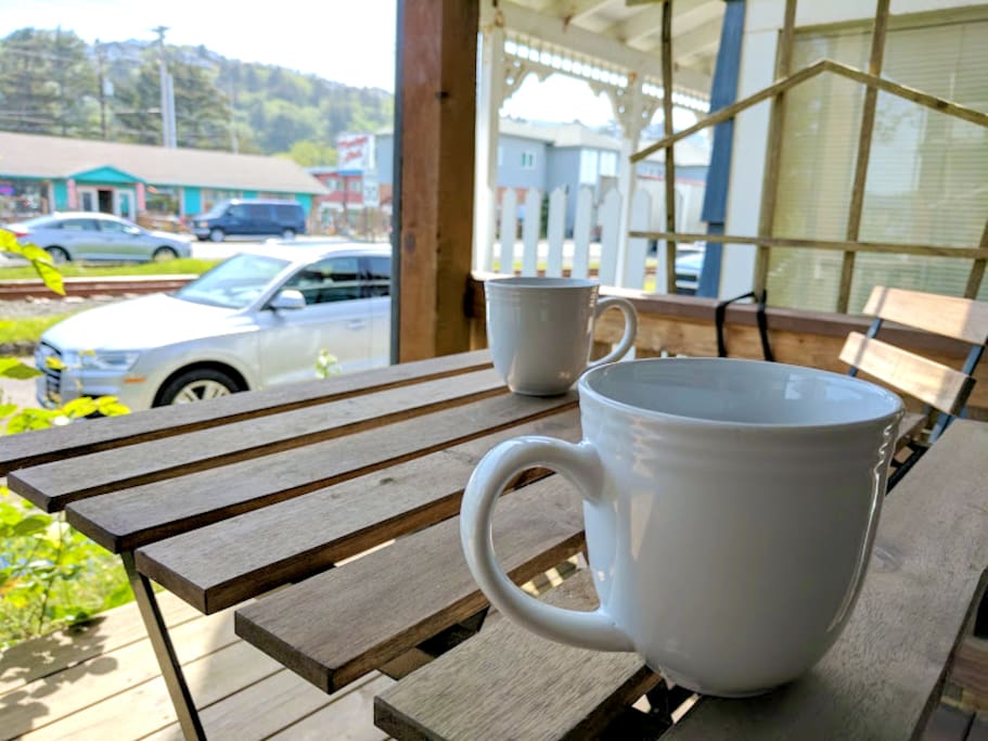 Enjoy a nice cup of coffee on covered front porch.