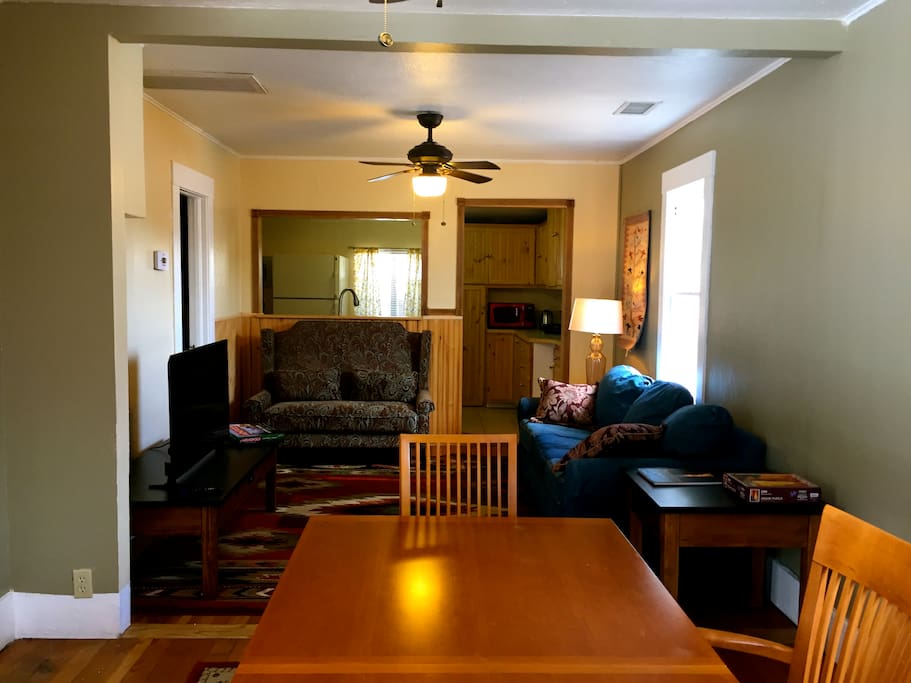 Dining and living room, with a pull-out bed couch.