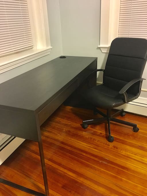 Bran new office desk with pens, highlighter and index cards in cabinet along with a comfy new chair!
