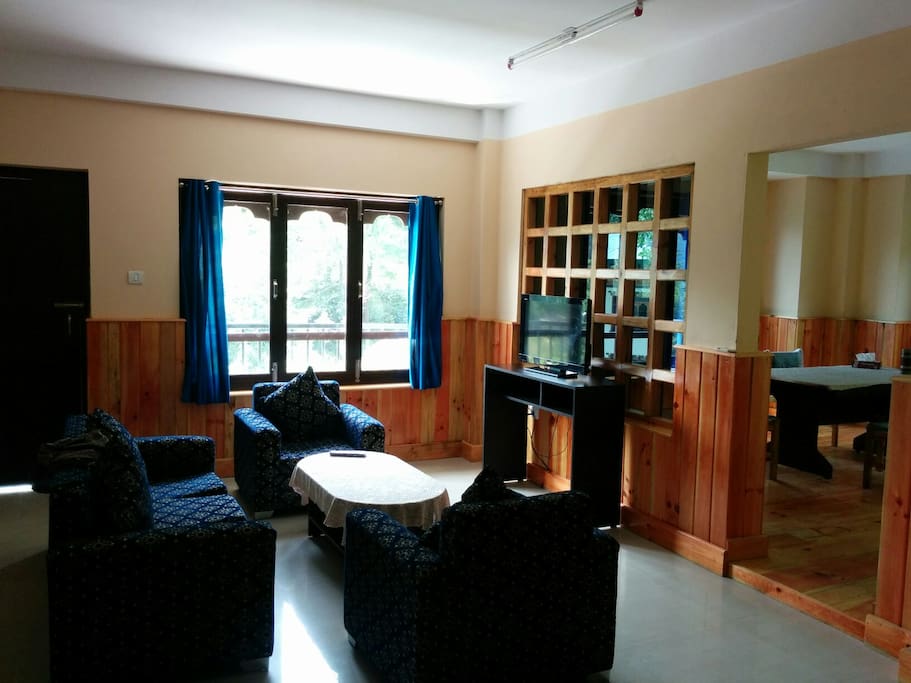 Fully furnished living room with tv and a good view.