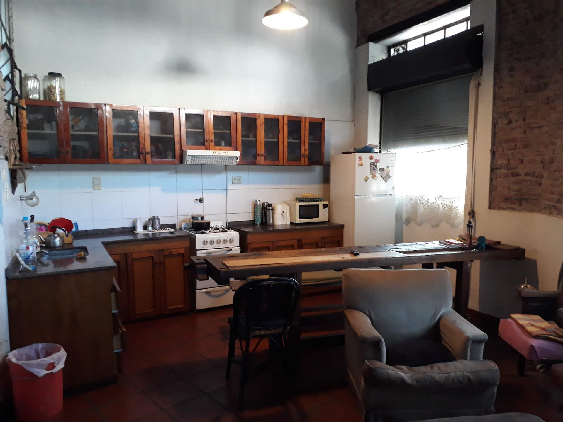 Quarto em casa compartilhada com banheiro privativo em Chacarita