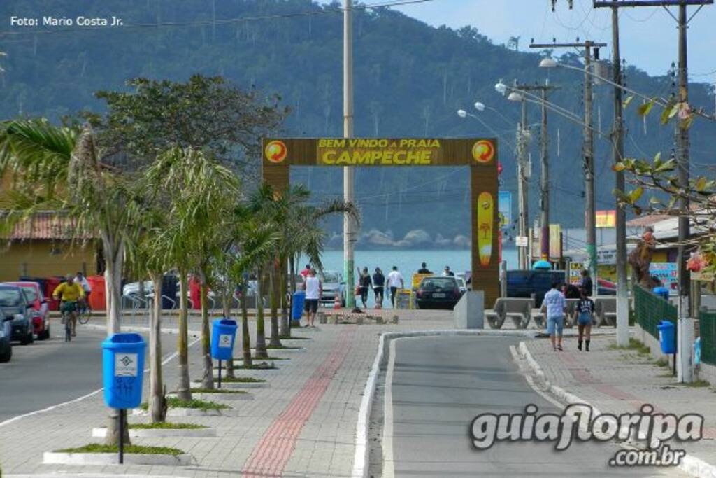 acesso a praia com calçadão, ciclovia