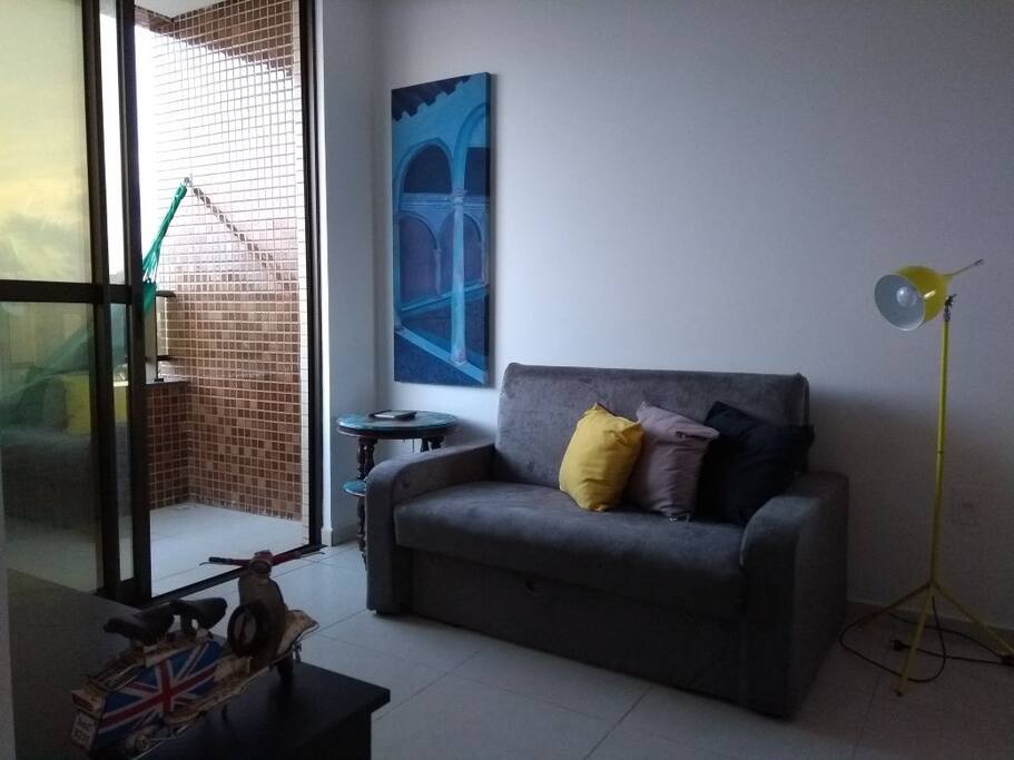 Sala com sofá-cama