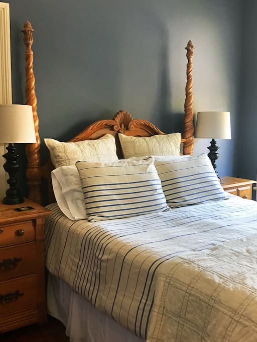 Luxury linens await you on the comfortable queen sized poster bed.