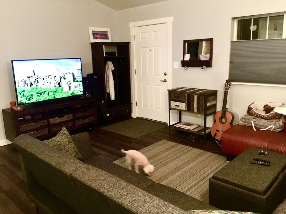 52” HD TV with cable, WiFi, Amazon Fire stick and a sound bar with Bluetooth capabilities. Hall tree for coats and spacious living space. To help you relax, the TV cart is filled with games, art supplies and there’s a yoga mat for you to continue your workouts while you’re away.