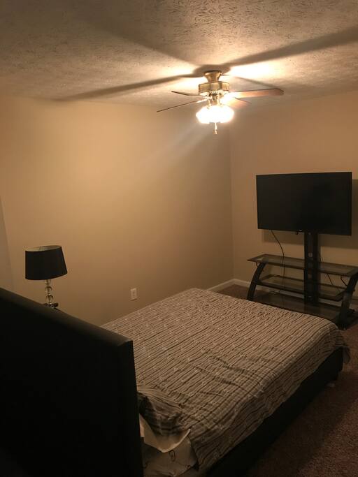 Reverse view of bdrm with 50" smartTV