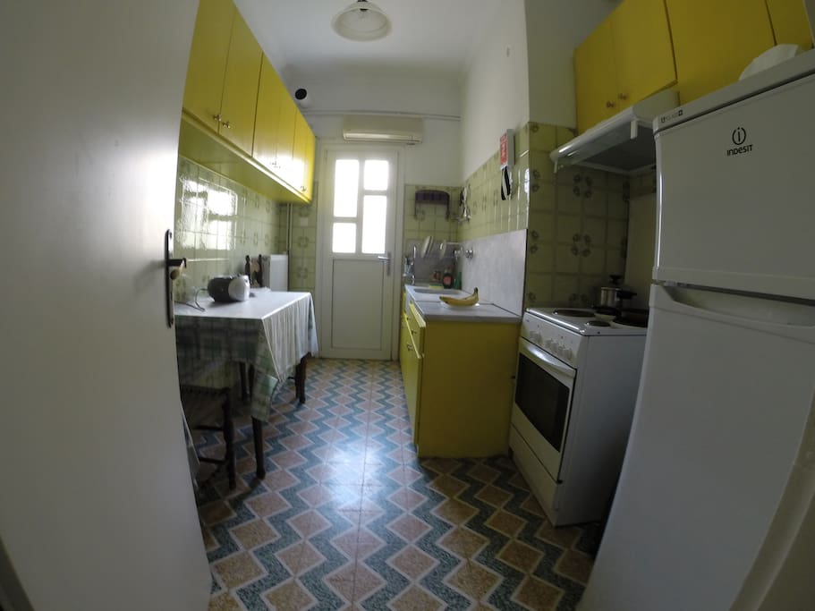 A sunny, spacious kitchen fully equipped for making meals