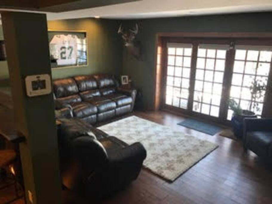 Walk out basement leads to backyard and grill.