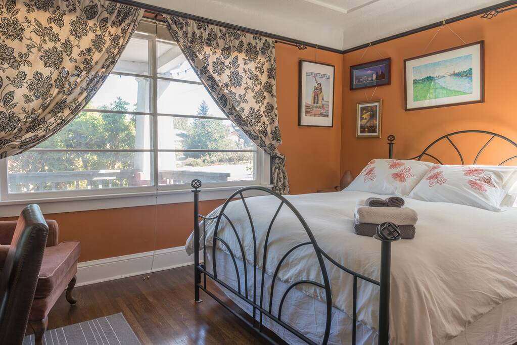 Bright, cheery room with blackout curtains and blinds