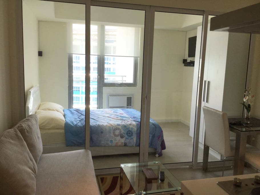 one-bedroom unit ... beachview ... with fast-speed internet and TV with cable channels in the bedroom and kitchen, DVD player and home theater sound system