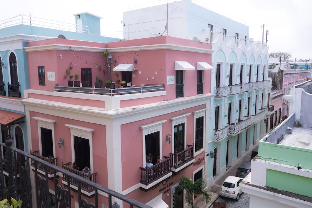Photo of Al Fresco and El Mezzanine right across the street. View FROM OUR balcony during the day.