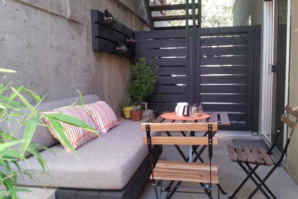 Entrance to the apartment through the private patio.