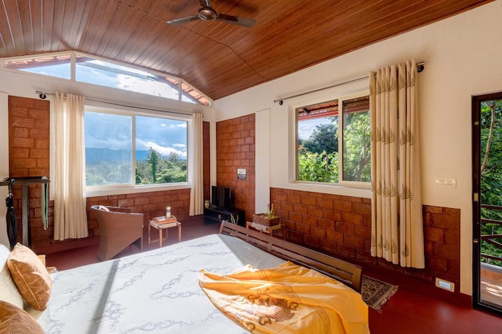 The top-end lovely sunset guest room with fantastic views of the Brahmagiri hills and forest