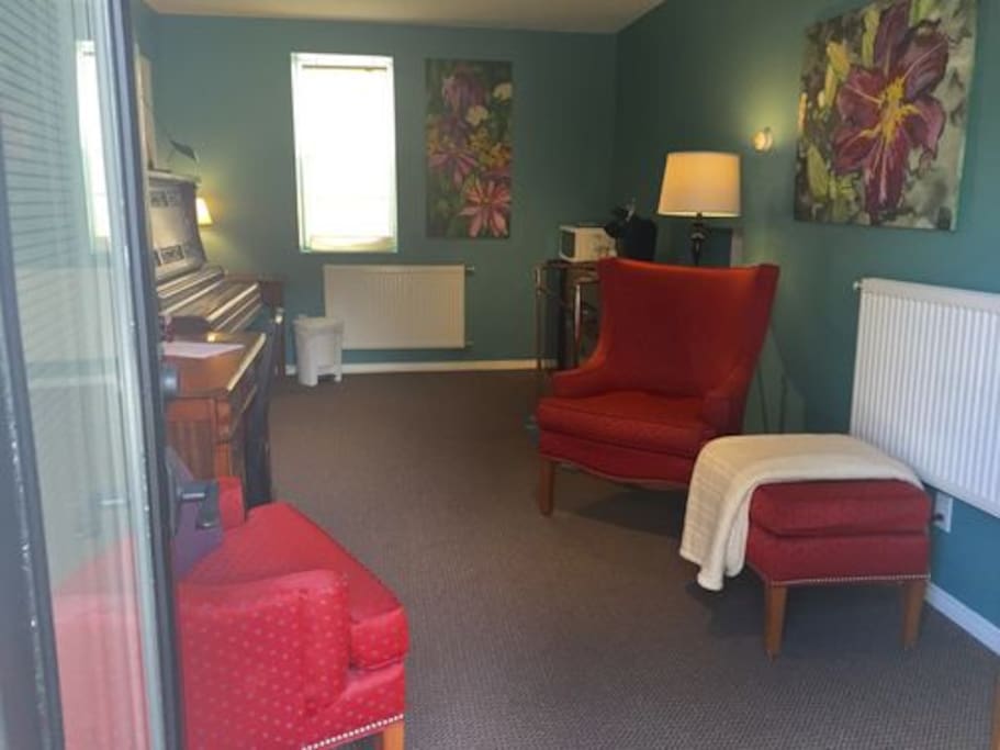 View of the sitting room from the French door entrance.
