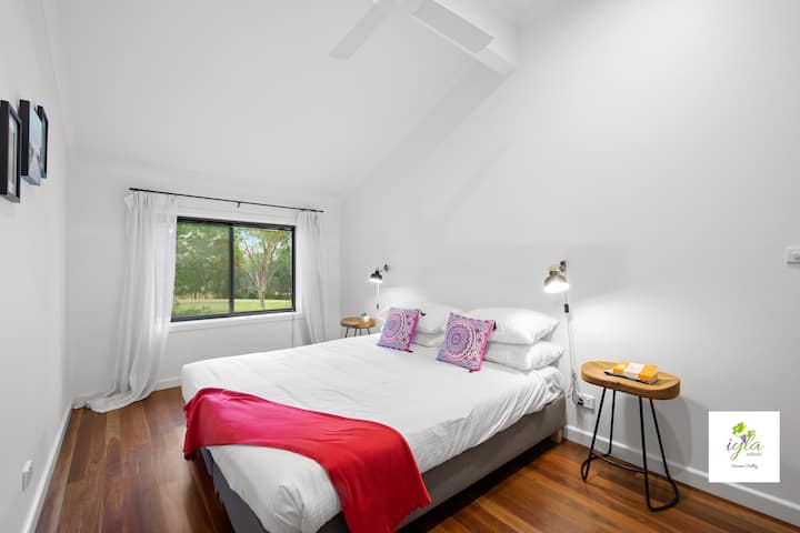 Downstairs Bedroom 2 with king bed & dam view