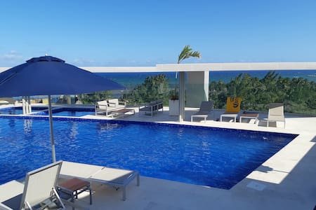 Condo Oceanview Pool Jacuzzi 1mn to 5th Av & Beach