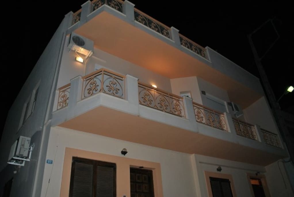 Front of home view . 2 nd floor apartment with balcony from Dining room.