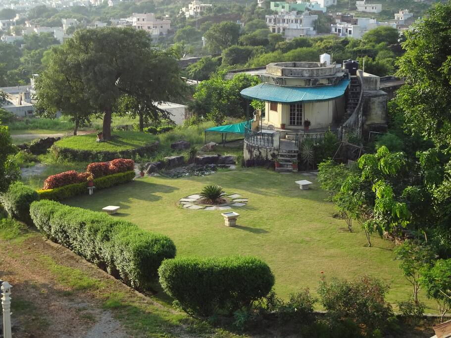 Lush garden with Lilly pool and commanding views of the valley.