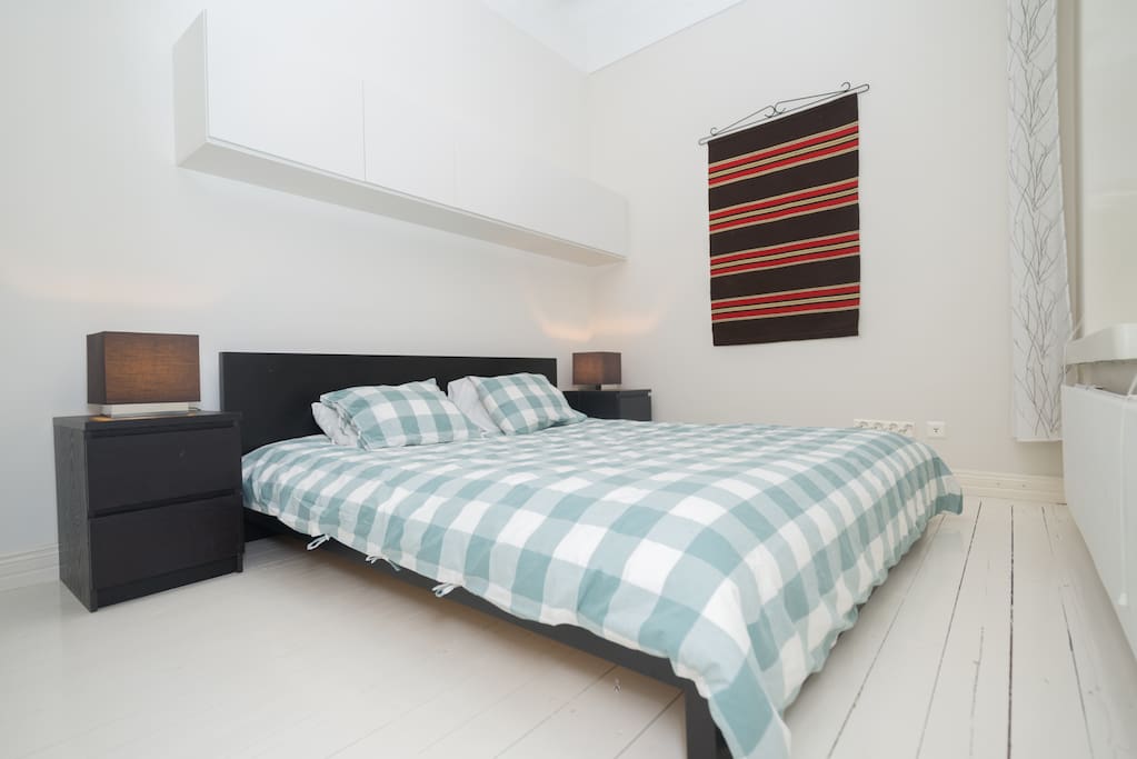 Spacious bedroom with extra-wide bed