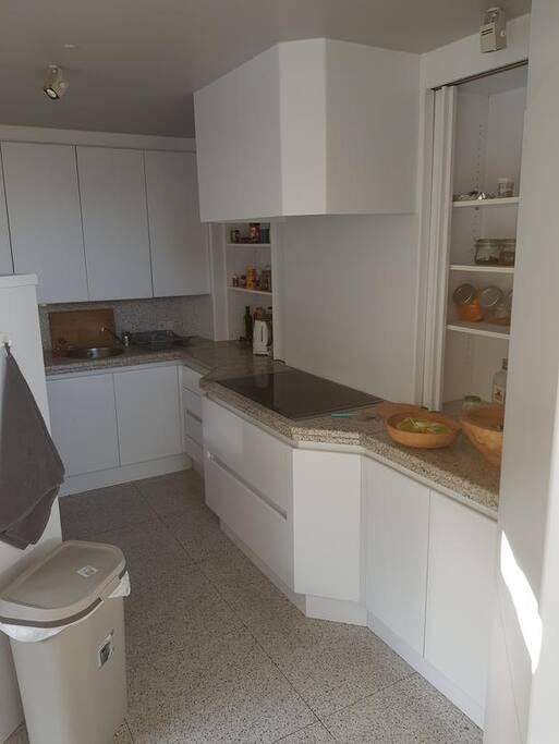Very well equipped kitchen, marble counter top, induction cooking with enough pans and saucepans. Also vegetable steamer, and juicer, food processor etc