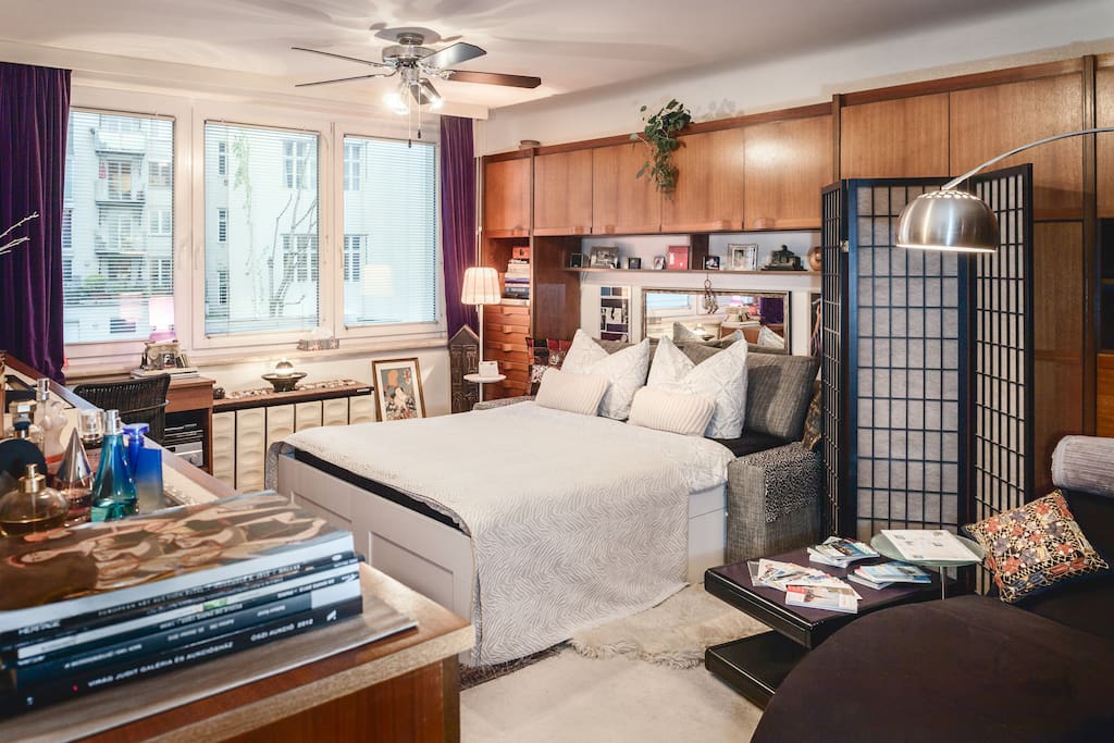 Your bed: high & comfy. An overhead fan provides a lovely breeze if necessary.