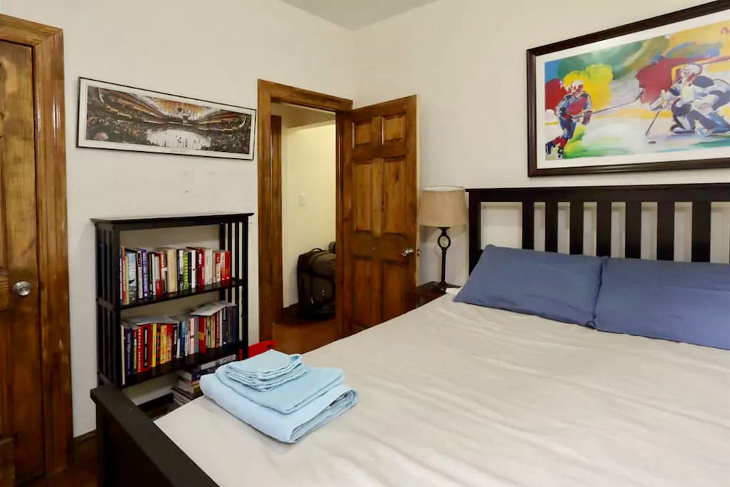 The bedroom has a queen sized bed, A/C, sunlight and plenty of closet space.