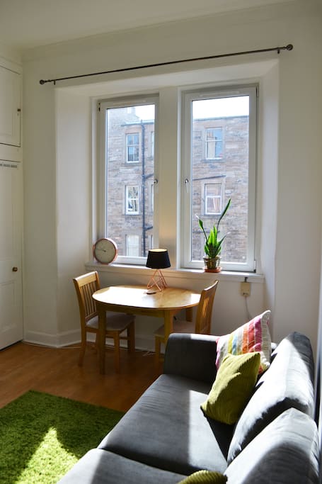 South facing large windows and dining table
