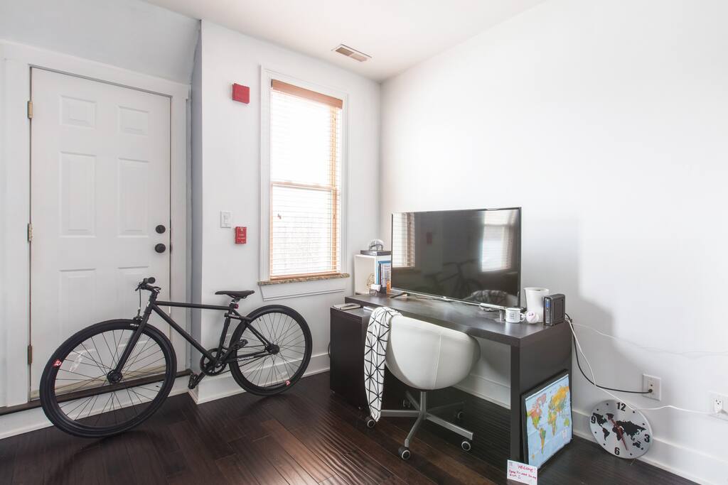 Door to fire escape. The TV has now been replaced by a projector.