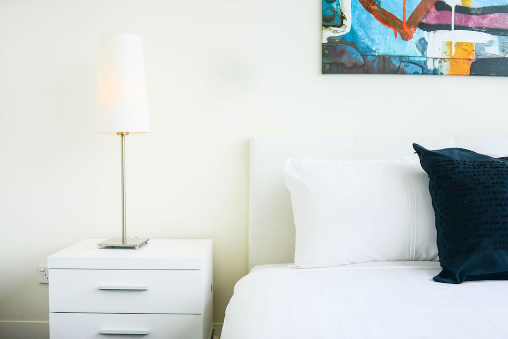 Comfortable and clean bed waiting for you