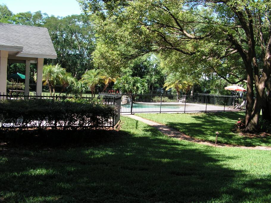 Pool house is located behind the main house.