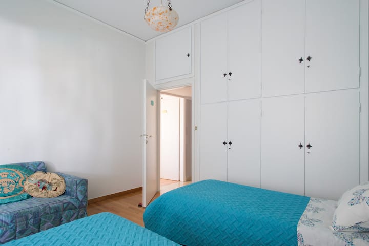 Posidon.Two single beds and a sofa bed.