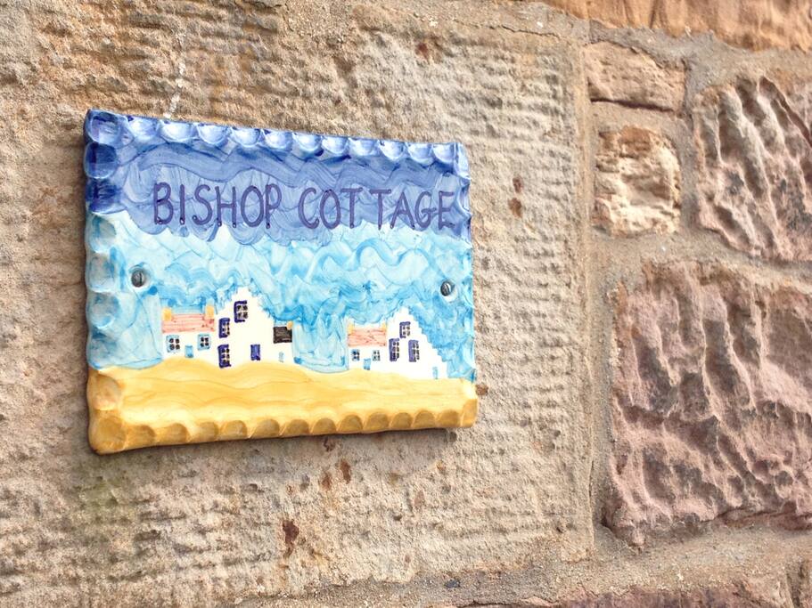 Our handpainted sign from Crail Pottery