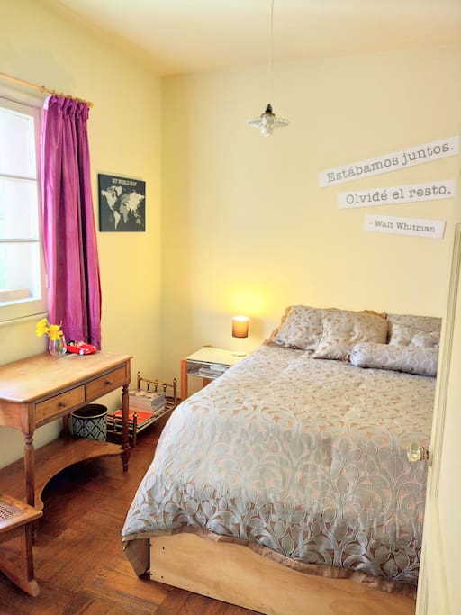 Room: it is a nice bright room that has a queen bed, a big window, desk, night table and closet