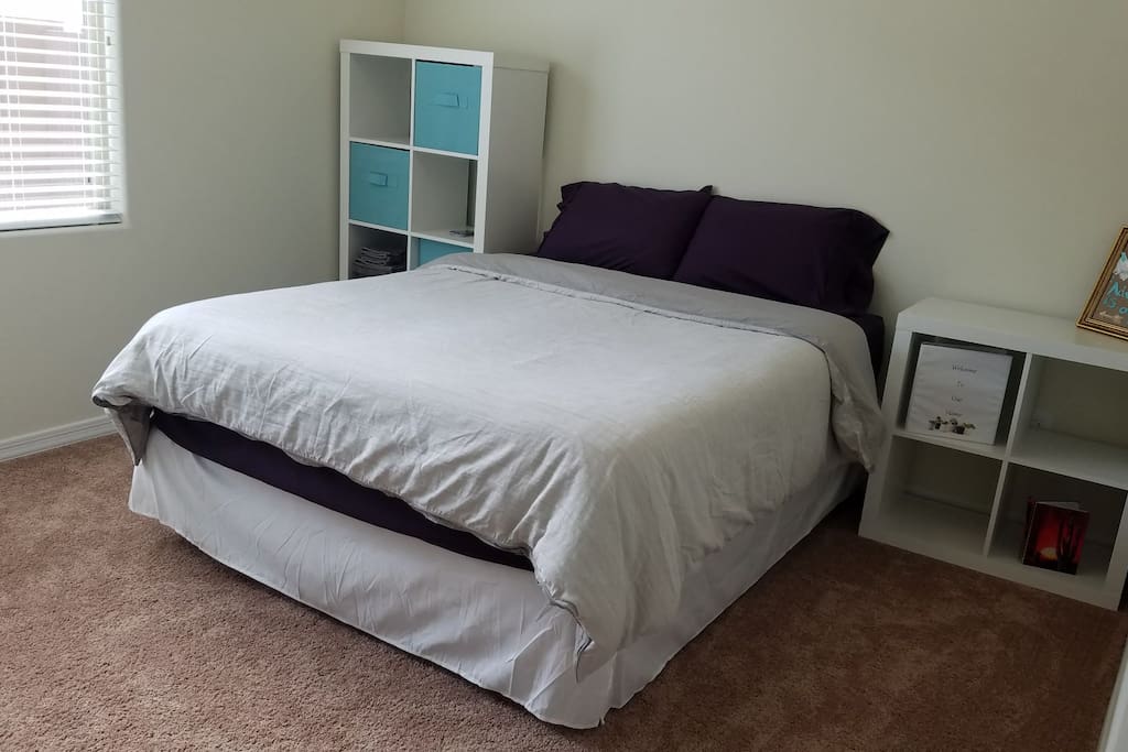 Guest bedroom (queen-sized bed with dresser and closet space)