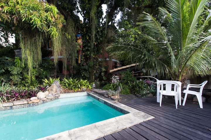 Private apartment in large garden with pool