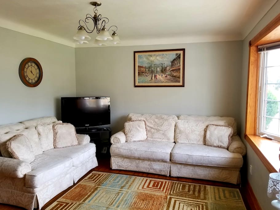 Comfy couches, from where the quiet street can be seen through the large bay window. TV with Roku/Netflix. Xbox. Hi-speed unlimited wifi.