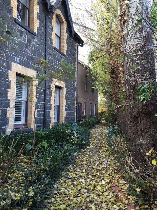 My apartment is set right back from the street, past the bluestone and at the end of the next building.