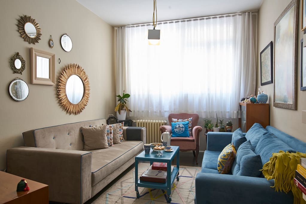 Living area: The sofa on the left can be transformed to a double bed.