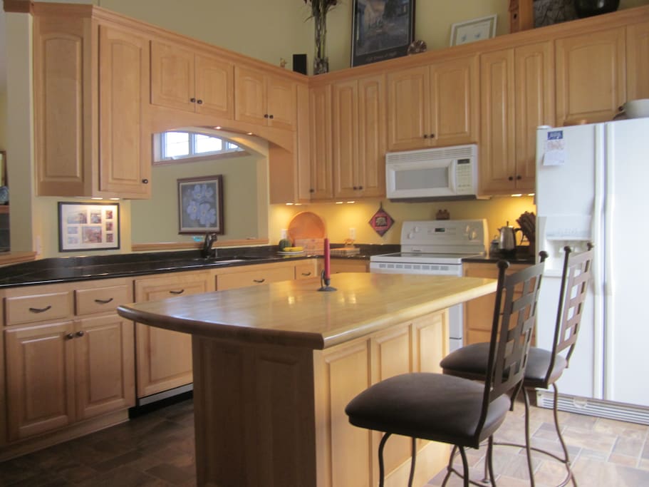 Main kitchen with everything leads to open living/dining