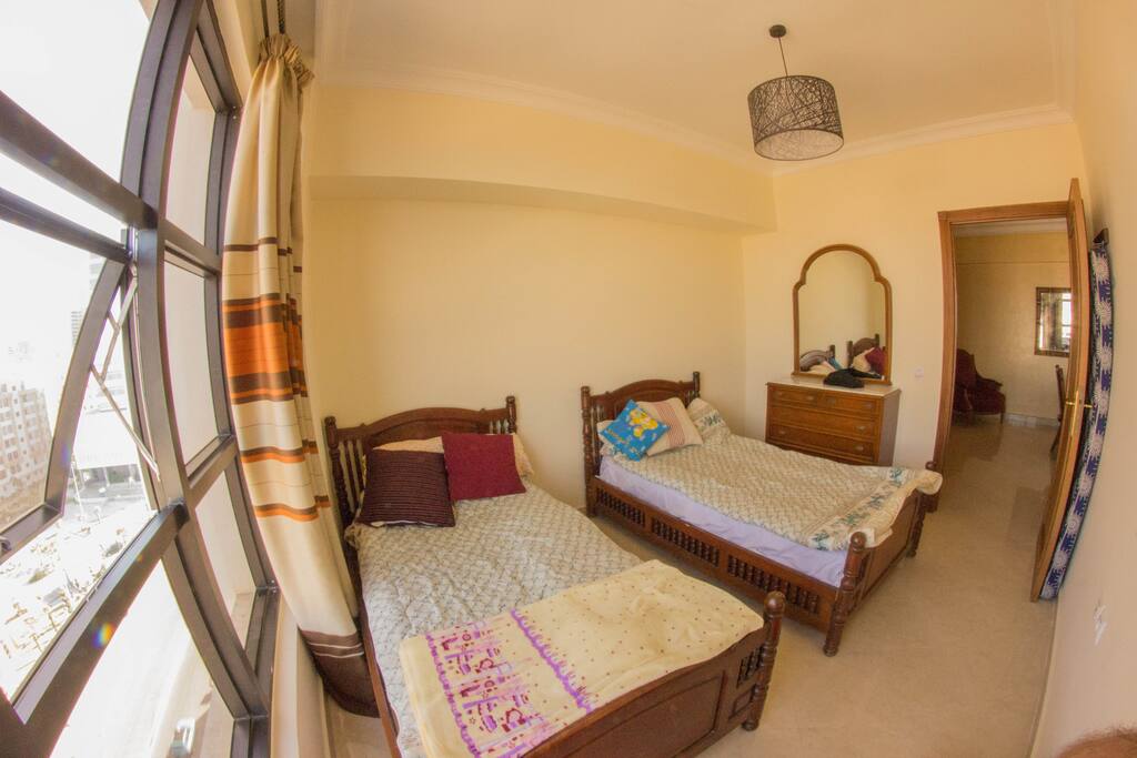second room with a view of the beach and the mall