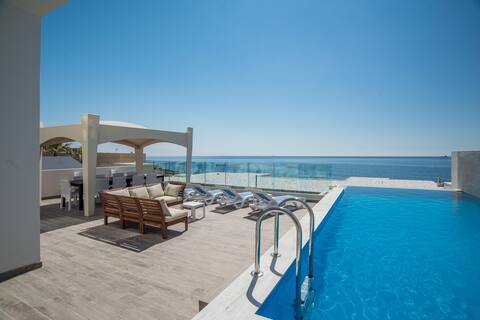 Sea front villa with private pool and games room!