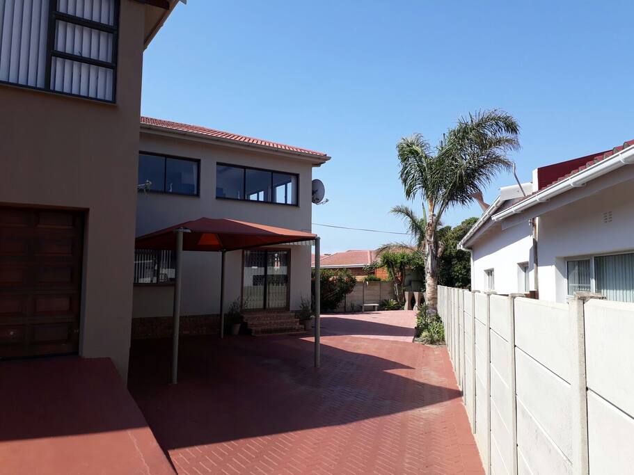 Private entrance and shaded parking