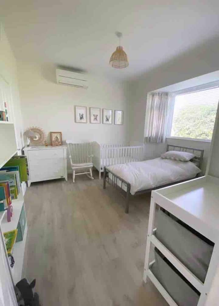 3rd bedroom with single bed and cot